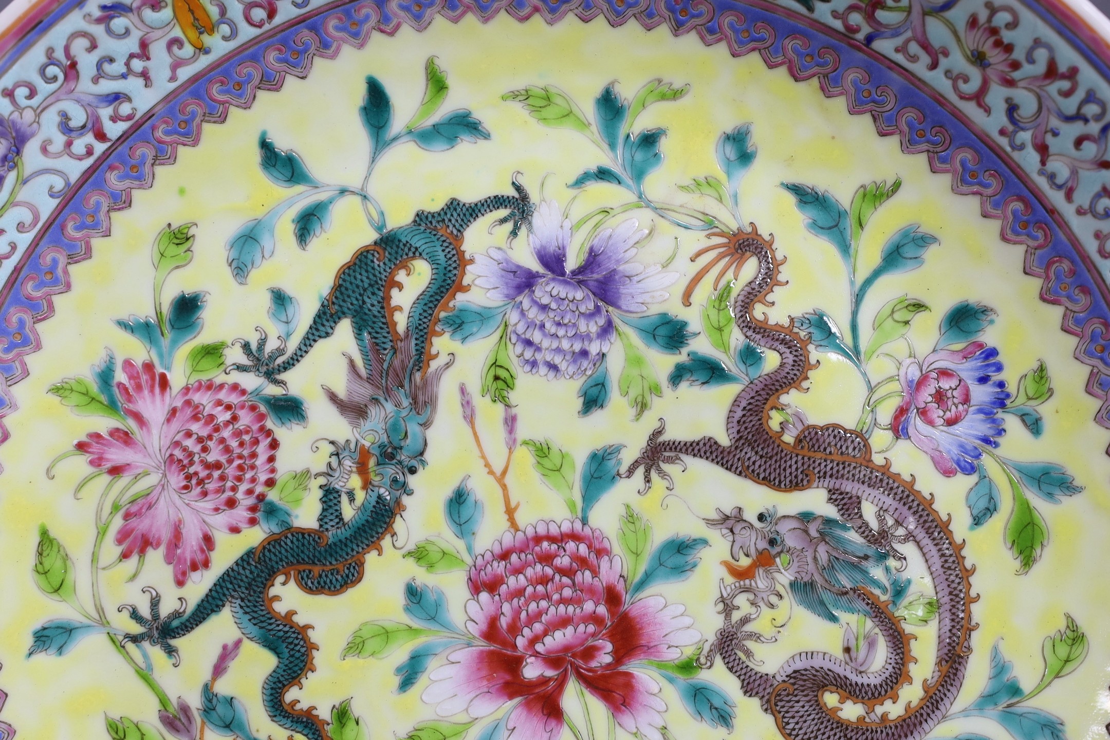 A Chinese yellow ground ‘dragon’ dish, Qianlong mark but Republic period, 34 cms diameter.
